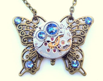 Steampunk Butterfly Necklace, Blue Swarovski Crystals, Neo Victorian,Edwardian Fantasy,Ruby Jeweled Watchmovement,Antiqued Brass Filigree