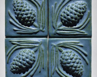 Rustic Blue tiles, pinecones fireplace backsplash