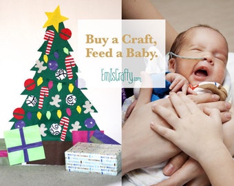 Deluxe Christmas Felt Tree Wall Activity. Build a Tree! Includes Command Hanging Strips! Buy a craft, feed a baby.