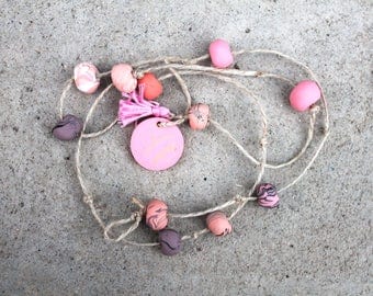 Clay hanging decor dusty pinks + purples + peaches