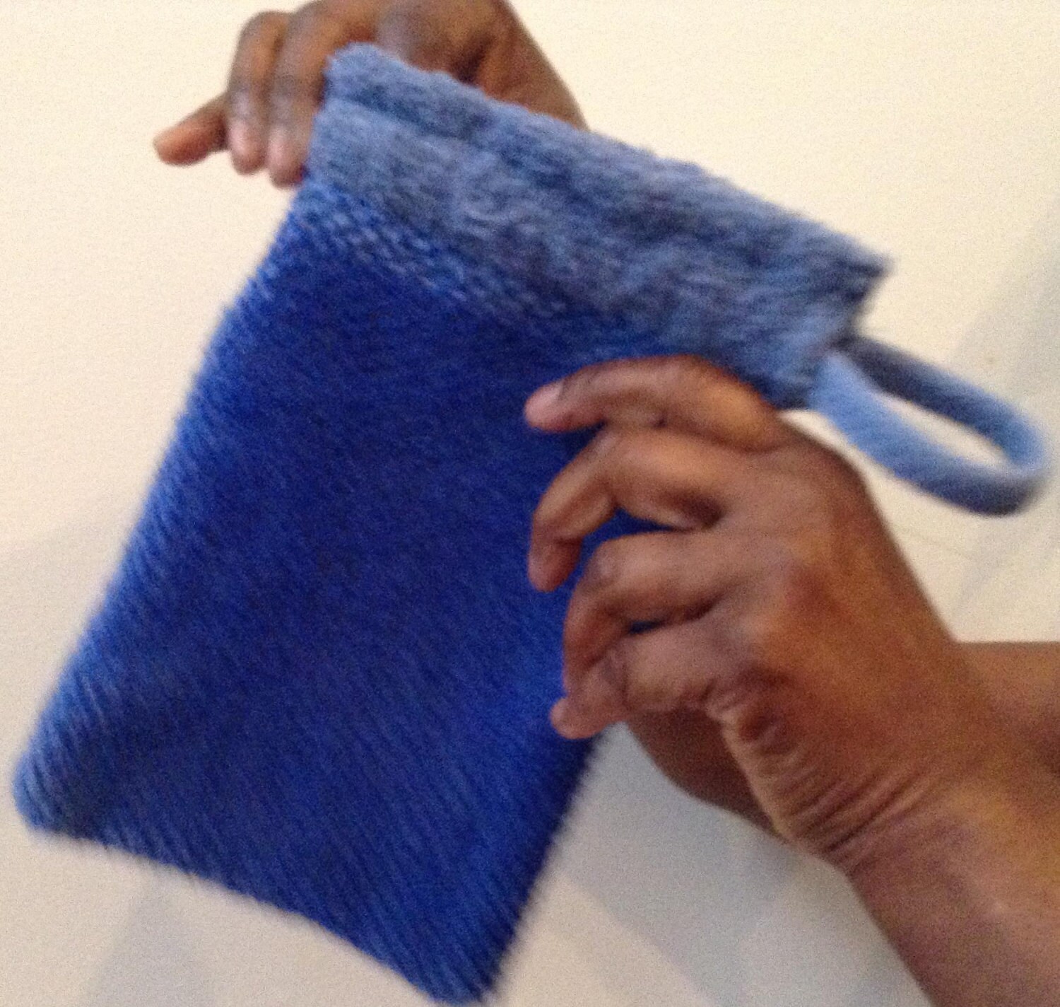 Soap saver pouch and washcloth mitt. Exfoliating washcloth