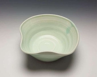 Handmade ceramic bowl by Potteryi. Celadon mixing bowl with a spout.