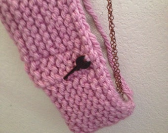 25% off original price until Sept. 8. Knitted purse w/shoulder strap. Muave. Lined. Love key adorns front.