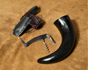 Drinking horn, all black, with corkscrew accessory and belt holster