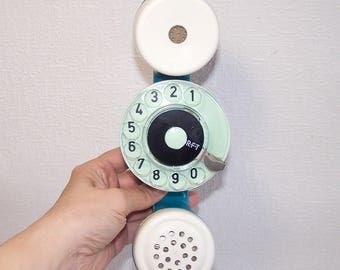 Vintage Rotary Handset with a Dialer. Wireman Gadget. Testing Dial Handset. Old Soviet Phone Receiver with a Dialing Disk.