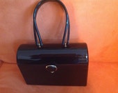 1950s Handbags, Purses, and Evening Bag Styles Vintage black lucite Wilardy handbag $133.00 AT vintagedancer.com