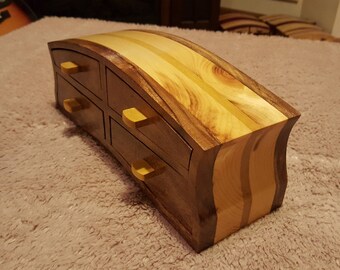 Bandsaw box featuring patagonia rosewood,,yellow heart,and pine