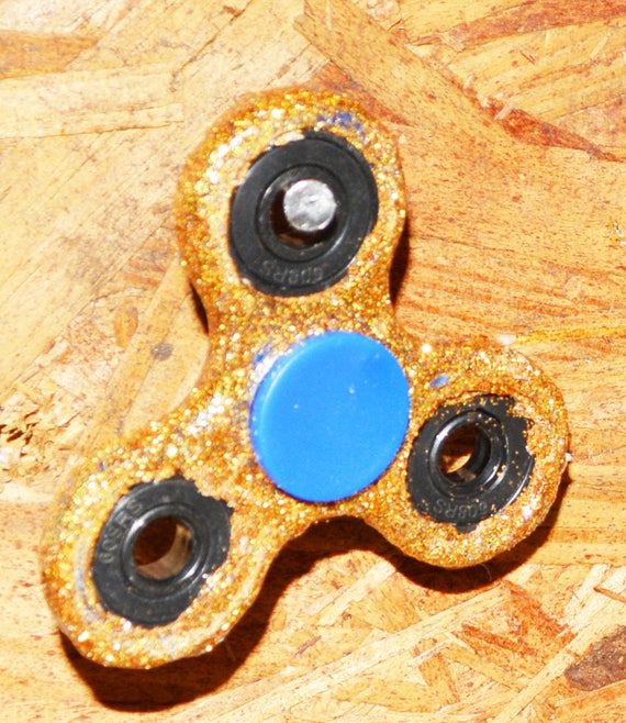 Items similar to RARE Gold fidget spinners on Etsy