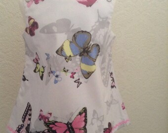 Spring /Summer pinafore Butterfly medley with whitw background. Age 1-2