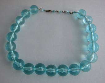 1950's, transparent turquoise plexi shokermade. Rare.