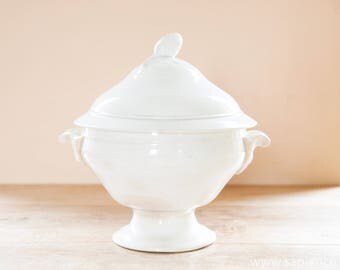 Antique French white ironstone tureen with artichoke on the lid in well used condition