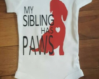 My sibling has paws onesie