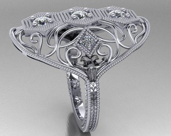 A modern twist to a 1930's Vintage ring in 14k White Gold