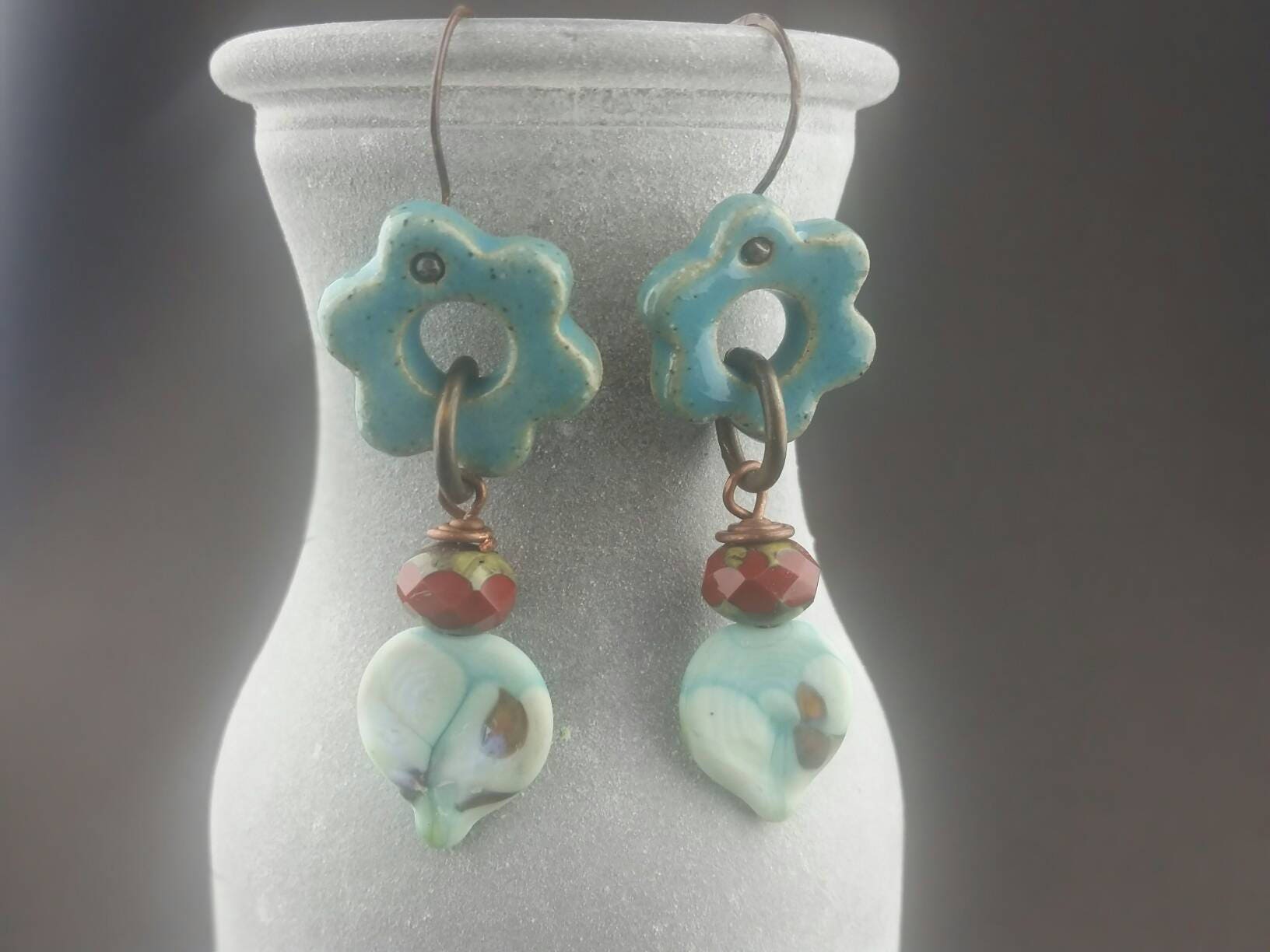 Antique copper earrings with ceramic daisies and glass