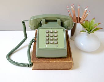 Green push button desk phone; working touch tone telephone; retro telephone; vintage phone