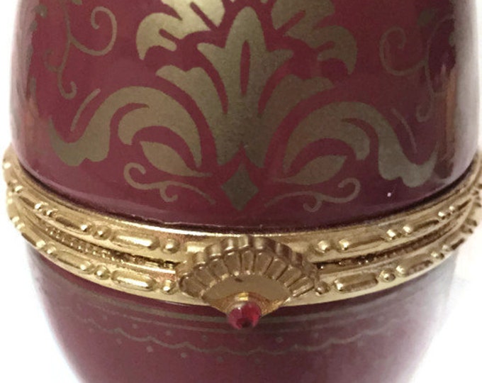 Faberge Style Egg with Watch - Red and Gold Three Footed Porcelain Egg with a Watch Hidding Inside,