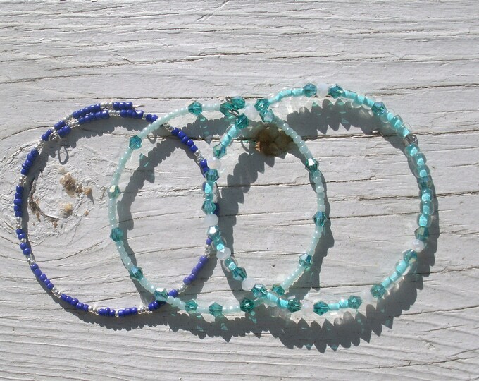 Stackable Bracelets, wire wrap bracelets, pair of similar colors and style, seed beads, crystal beads, blue, teal, turquoise color, white