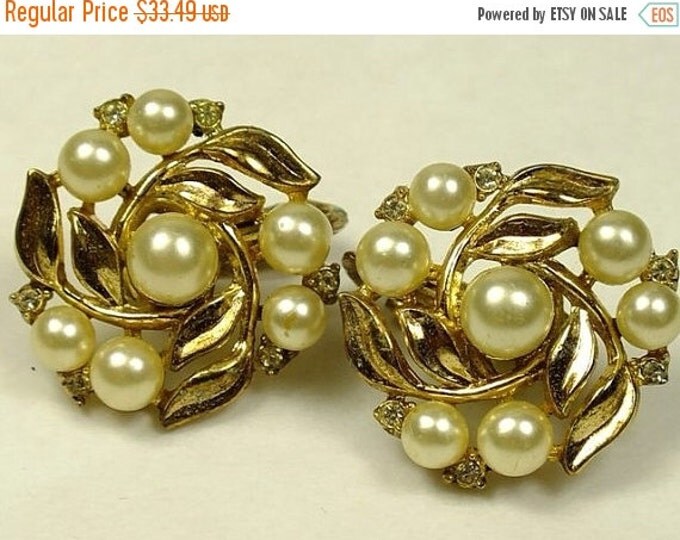 Storewide 25% Off SALE Beautiful & Lovely SIGNED pair of vintage Trifari clip earrings with faux pearl and clear rhinestone accents