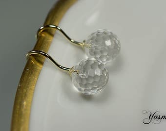 585er yellow gold with faceted rock crystal