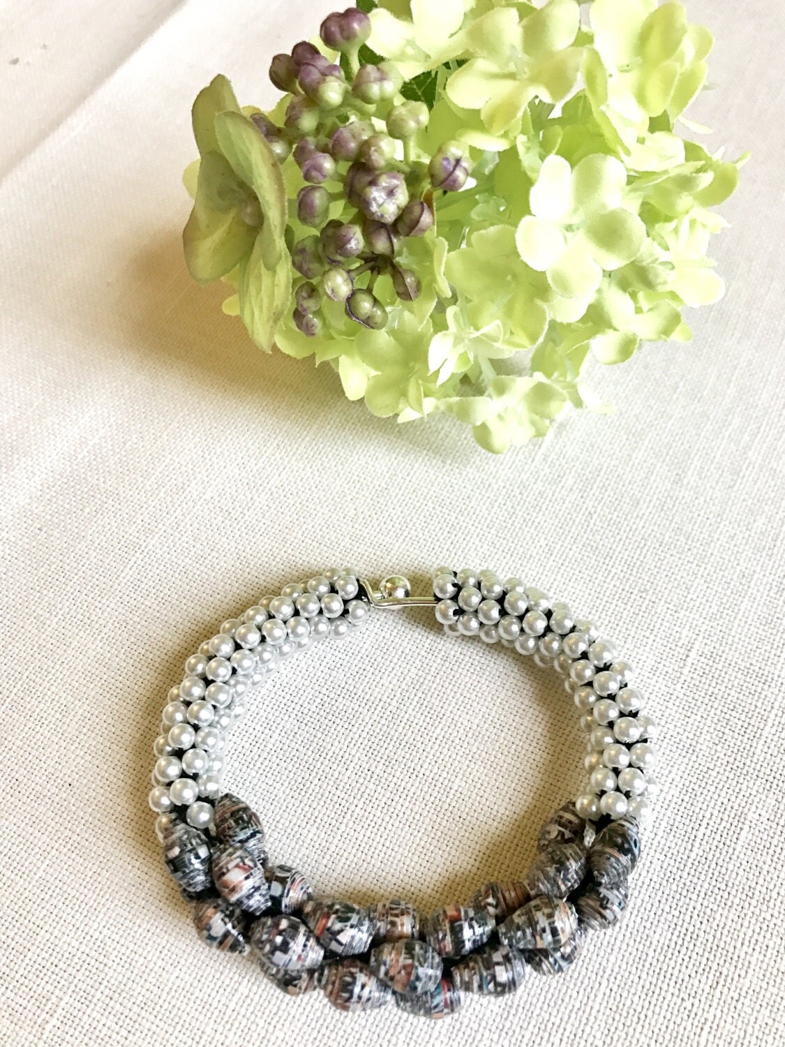 CIJ Silver cuff bracelet made with small ivory pearls and leopard color