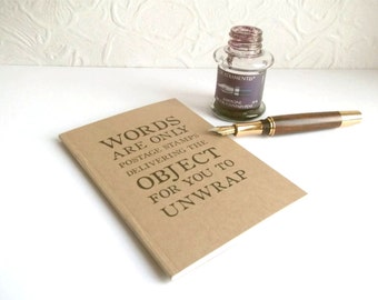 George Bernard Shaw Notebook - Words & Postage Stamp Quote | Recycled A6 Kraft Journal, ruled grid or plain pages | Witty gift for logophile