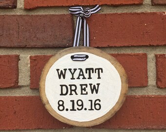Custom wood burned and painted baby name and birth date sign with ribbon