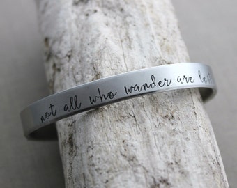 not all who wander are lost, Hand stamped aluminum bracelet, 1/4 Inch Bangle Silver tone Cuff Bracelet, Lightweight, Traveler - wanderer