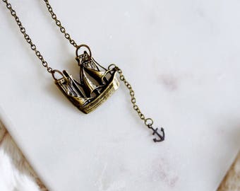 seven seas. a nautical ship and anchor necklace