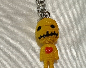 yellow voodoo doll