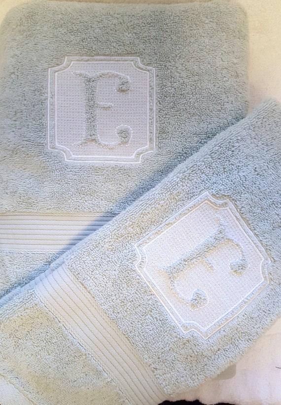 Bath towels personalized with embossed monogram Initial