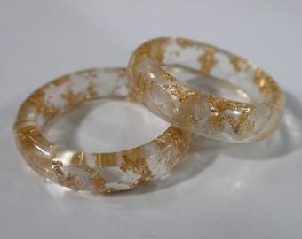 Gold Resin Ring! Shiny Gold Flakes are scattered throughout this lovely clear Resin Ring! A ring to compliment many outfits! Eco Ring