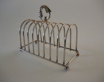 A large vintage silver plated toast rack cake slice server