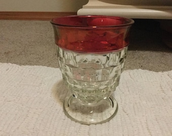 Vintage cranberry red and clear glass footed glass