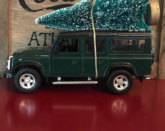 Land Rover Defender Carrying Christmas Tree Ornament