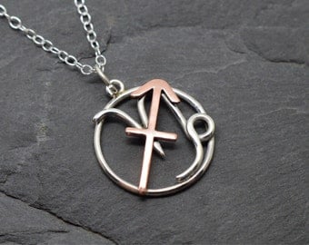 Capricorn Sagittarius zodiac necklace sterling silver and polished copper