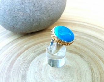 Turquoise silver ring, blue stone harakeke ring set in sterling silver & gold embelished with Maori Harakeke design.