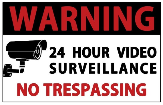 Warning 24 Hour Video Surveillance No Trespassing Sign.