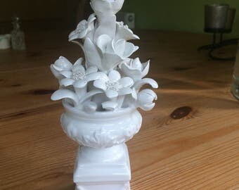 Vintage white porcelain flowers in gardiniere