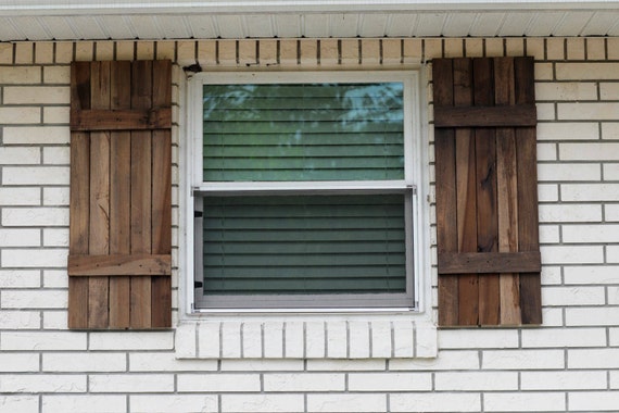 Rustic farmhouse  style exterior shutters  salvaged poplar wood
