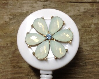 Flower badge reel