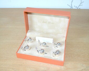 Bobs snails in silvery metal, Saint Hilaire, Paris