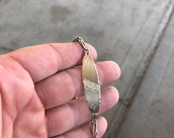 Sterling bracelet (etched).