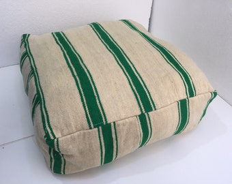 Unique kilim pouf cube shaped.