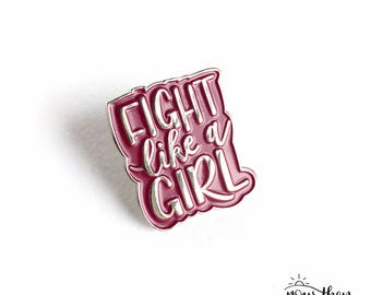 Fight like a girl pin badge