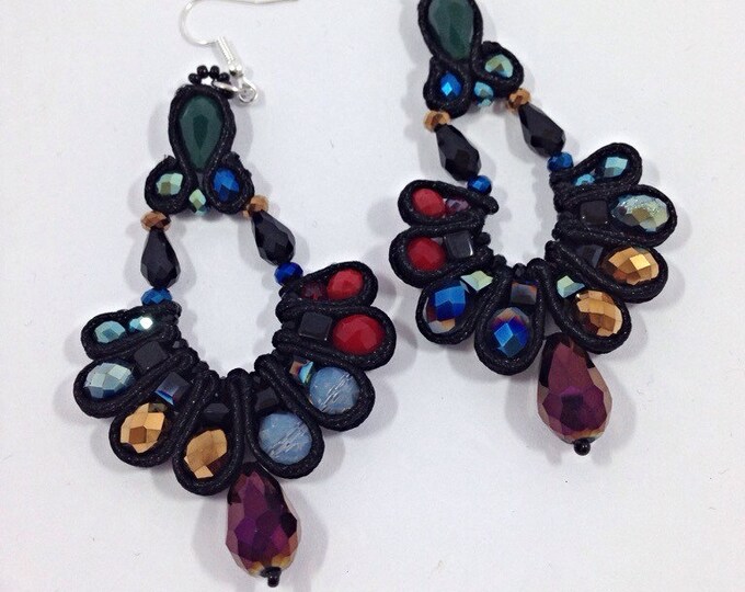Black beautiful earrings with different colored crystals