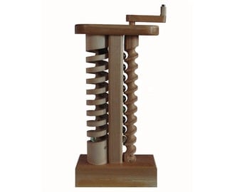 The Crank: A wooden toy with marbles hand crafted in Vermont. Great gift for a grandchild or for your desktop or coffee table.