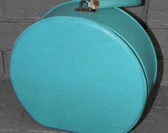 VINTAGE turquoise colored suitcase / luggage