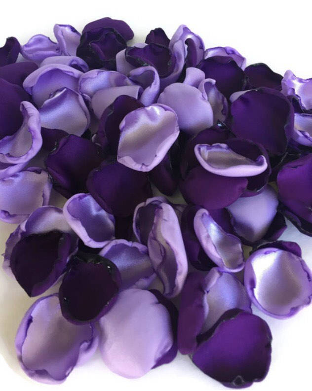 Purple and lavender rose petals flower petals table