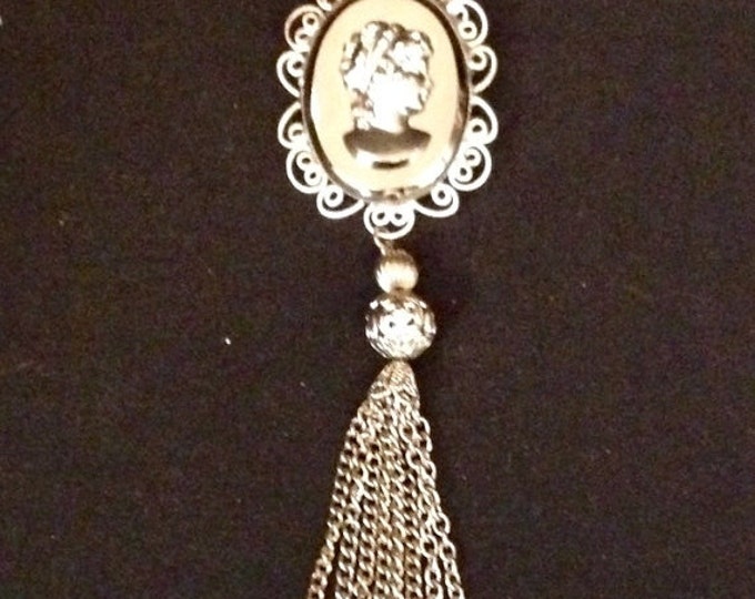 Storewide 25% Off SALE Vintage Silver Tone Designer Cameo Brooch Pendant With Matching Tassel Featuring Mirrored Lace Trim Design