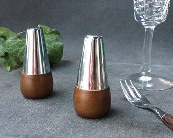 Salt and pepper shakers vintage wood and metal chrome. Wood pepper and salt shaker
